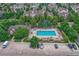 Community swimming pool with surrounding patio and ample parking at 8457 S Hoyt Way # 206, Littleton, CO 80128