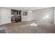 Spacious basement area with wet bar, perfect for entertaining at 7765 Yankee Ct, Arvada, CO 80007