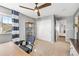 Calm bedroom with neutral colors, natural light, and a closet at 7765 Yankee Ct, Arvada, CO 80007