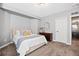 Light-filled bedroom with a plush bed, soft textures, and modern accents at 7765 Yankee Ct, Arvada, CO 80007