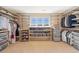 Spacious walk-in closet with custom shelving and storage solutions, bathed in natural light at 7765 Yankee Ct, Arvada, CO 80007