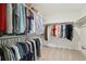 Walk-in closet with double racks and ample space for clothes and storage at 3365 S Poppy St, Morrison, CO 80465