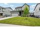 Beautiful two-story home with an attached garage and well-kept landscaping at 3365 S Poppy St, Morrison, CO 80465