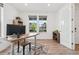 Bright office space with modern finishes, hardwood floors, natural light and a sit/stand desk at 3365 S Poppy St, Morrison, CO 80465