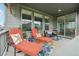 Covered patio with comfortable seating and outdoor furniture at 3365 S Poppy St, Morrison, CO 80465