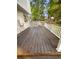 A wooden deck with white railings at 14822 E Adriatic Pl, Aurora, CO 80014