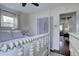 Bright bedroom with a four-poster bed and hardwood floors at 5191 S Logan St, Littleton, CO 80121