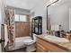 Renovated bathroom featuring decorative tile, granite counters, and stylish fixtures at 17162 E Atlantic Pl, Aurora, CO 80013
