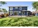 Large backyard with a well-maintained lawn and patio featuring gazebo and shed at 17162 E Atlantic Pl, Aurora, CO 80013
