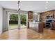 Eat-in kitchen with stainless steel appliances, granite countertops, and a view of the backyard at 17162 E Atlantic Pl, Aurora, CO 80013
