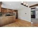 Bright eat-in kitchen with stainless steel appliances and wood floors at 17162 E Atlantic Pl, Aurora, CO 80013
