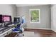Bright office space with hardwood floors and a large window at 17162 E Atlantic Pl, Aurora, CO 80013