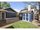 Backyard shed with a white trim, offering extra storage space at 17162 E Atlantic Pl, Aurora, CO 80013