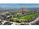 Expansive aerial shot of 6961 Salvia St. that shows its neighborhood location and surrounding landscape at 6961 Salvia St, Arvada, CO 80007