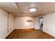 Unfinished basement room with carpet and doorway at 2600 S Downing St, Denver, CO 80210