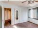 Simple bedroom with carpet and a mirrored door at 2600 S Downing St, Denver, CO 80210