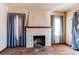 Brick fireplace in a living room at 2600 S Downing St, Denver, CO 80210