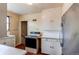 View of the kitchen's appliances and cabinetry at 2600 S Downing St, Denver, CO 80210