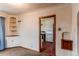 Quaint kitchen with white cabinets and stainless steel appliances at 2600 S Downing St, Denver, CO 80210