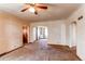 Open living room with built-in shelving at 2600 S Downing St, Denver, CO 80210