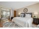 Comfortable bedroom offers bright natural light and ample closet space at 3079 E Long S Cir, Centennial, CO 80122