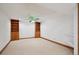 Bonus room with carpet, shelving and ceiling fan at 3079 E Long S Cir, Centennial, CO 80122