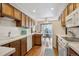 Well-lit kitchen with white countertops and ample storage cabinets at 3079 E Long S Cir, Centennial, CO 80122