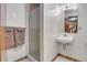 This bathroom features a glass shower, sink, and wood trim at 4863 Silver Spruce Ln, Evergreen, CO 80439