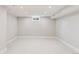 Finished basement area with neutral tones, recessed lighting and ample space at 260 S Jasmine St, Denver, CO 80224