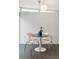 Cozy eating nook featuring a tulip table and stylish lighting, perfect for casual dining at 260 S Jasmine St, Denver, CO 80224