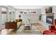 Cozy living room boasts a fireplace, natural light, hardwood floors, and comfortable seating at 260 S Jasmine St, Denver, CO 80224
