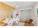 Bright office area with large desk, overhead lighting, and closet space at 260 S Jasmine St, Denver, CO 80224