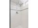 Shower with white subway tile and a decorative accent stripe at 260 S Jasmine St, Denver, CO 80224