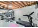 Basement gym features an exercise machine and a treadmill at 6839 Zenobia St # 3, Westminster, CO 80030