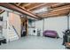 Finished basement features washer/dryer and a cozy sofa at 6839 Zenobia St # 3, Westminster, CO 80030