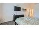 Cozy bedroom, with lots of storage, neutral carpet and natural light through window at 6839 Zenobia St # 3, Westminster, CO 80030
