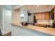 Bright kitchen with stainless steel appliances, light wood cabinets and breakfast bar perfect for gatherings at 6839 Zenobia St # 3, Westminster, CO 80030