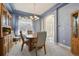 Dining room with wood table, six chairs, hutch and decorative ceiling at 12453 Knox Ct, Broomfield, CO 80020