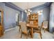 Dining room with wood table, six chairs, hutch and decorative ceiling at 12453 Knox Ct, Broomfield, CO 80020