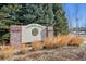 Crofton Park neighborhood sign with brick pillars and lots of landscaping at 12453 Knox Ct, Broomfield, CO 80020