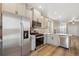 Well-equipped kitchen featuring stainless steel appliances and an adjacent dining area at 18338 E 93Rd Pl, Commerce City, CO 80022
