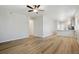 Bright and airy living room with hardwood floors and an open concept layout at 18338 E 93Rd Pl, Commerce City, CO 80022