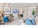 Versatile bonus room is the perfect spot for relaxing or working, featuring comfortable seating and workstations at 3373 N Catawba Way, Aurora, CO 80019