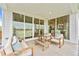 Outdoor living space with comfortable seating, lanterns, and large sliding doors to indoor area at 3373 N Catawba Way, Aurora, CO 80019