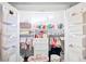 Adorable closet, organized with toys, clothing, and accessories at 3884 Osceola St, Denver, CO 80212