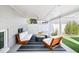 Inviting covered outdoor patio with modern furniture, string lights, and a cozy atmosphere at 3884 Osceola St, Denver, CO 80212
