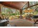Inviting outdoor living space on the deck, surrounded by natural beauty and tranquility at 4407 Delaware Dr, Larkspur, CO 80118