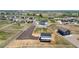 Aerial view of the property with a barn and a large lot at 16197 Paris Way, Brighton, CO 80602