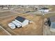 Aerial view of the property with a barn, RV and a fenced yard at 16197 Paris Way, Brighton, CO 80602