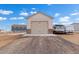 Front of the barn with an RV and parking on a gravel driveway at 16197 Paris Way, Brighton, CO 80602